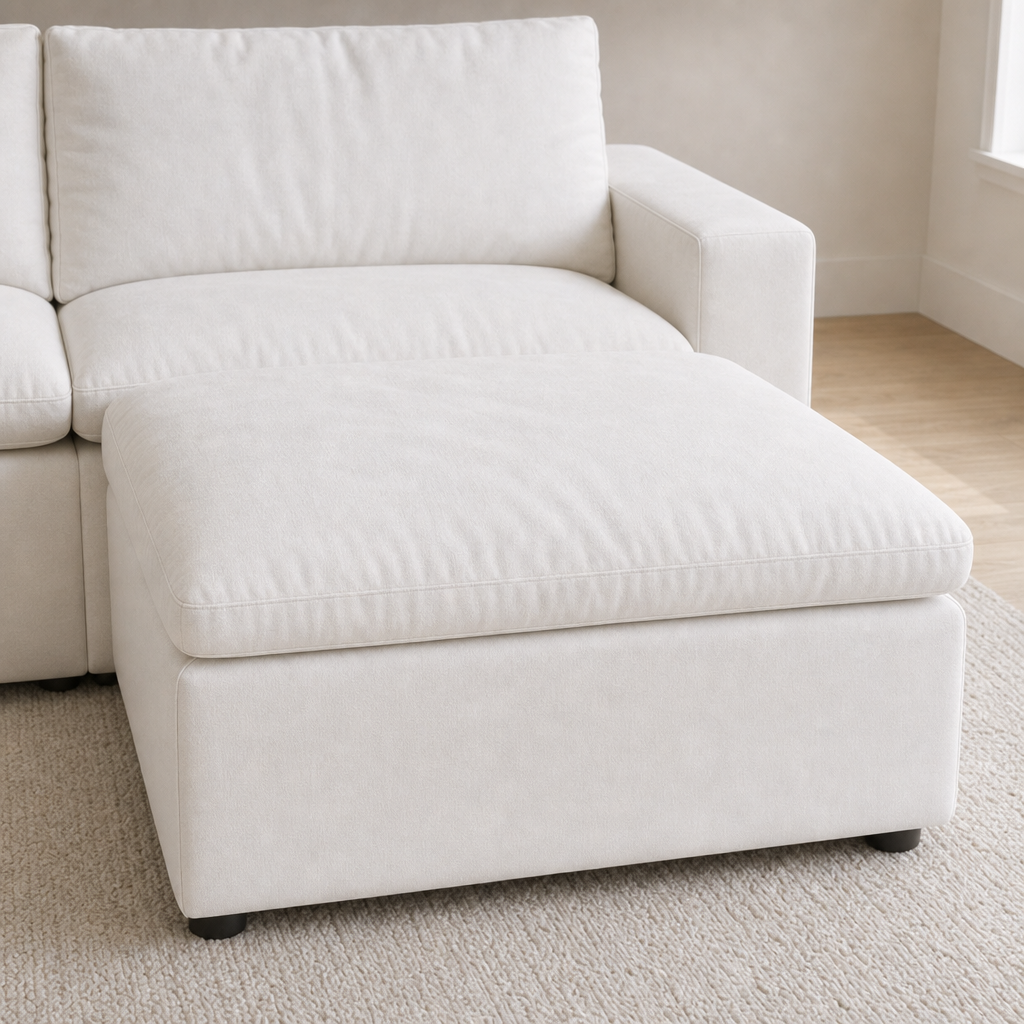 Storage Ottoman (Add-On) in White — connected flush to a Cloud Couch seat forming a chaise, close-up