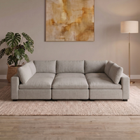 6 Piece Pit modular sofa in Light Grey, three seats with three ottomans forming one bed-sized platform