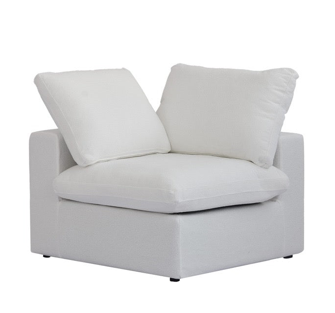Corner / Edge Module in White, three-quarter view showing the two backrest cushions meeting at the corner